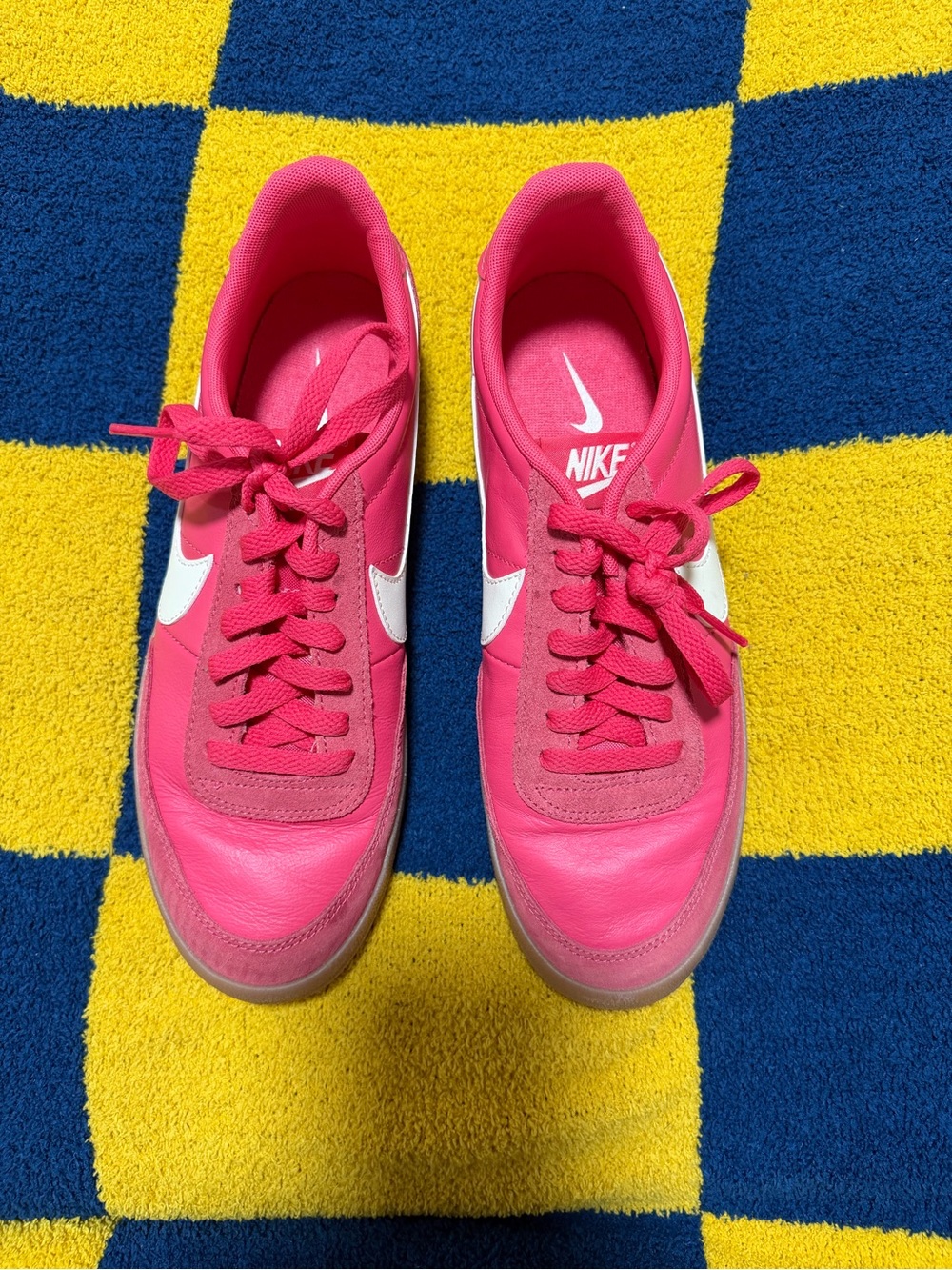 Nike Pink Women's Low-Top Sneakers with White Swoosh